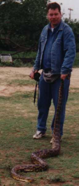 Ralphy fights an Anaconda snake
